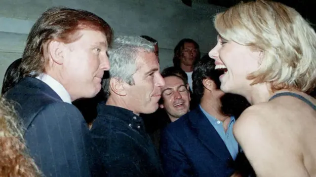 Donald Trump alongside Jeffrey Epstein with a blonde woman to the right of them laughing