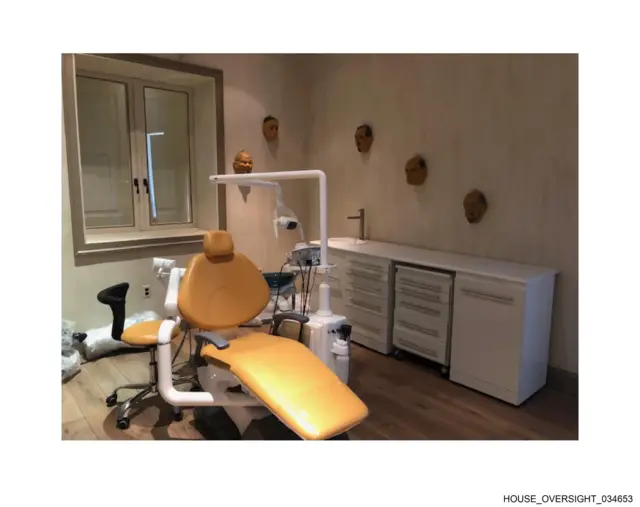 A dental chair in a room on Epstein's island