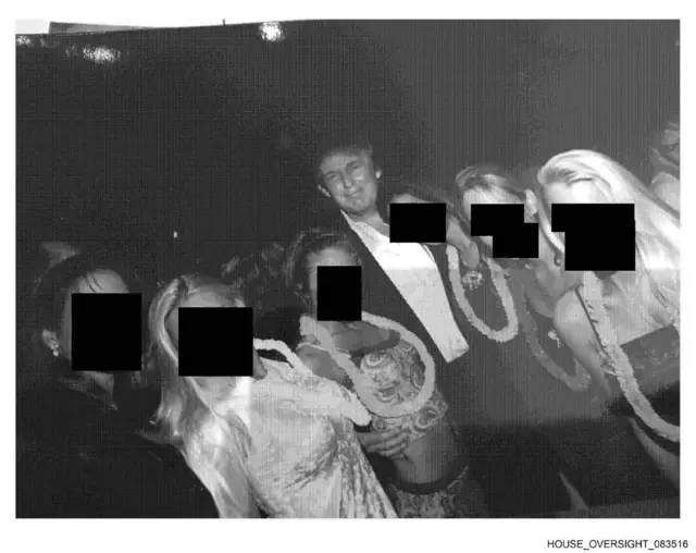 Trump stands with 6 women who have had their faces redacted. the image is black and white, the women wear leis. at least one is in a bikini, the others wear party clothes. the president is smiling. it appears to be nighttime.