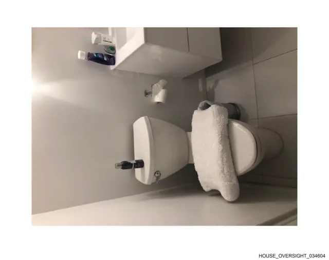 A photo of a toilet inside a room