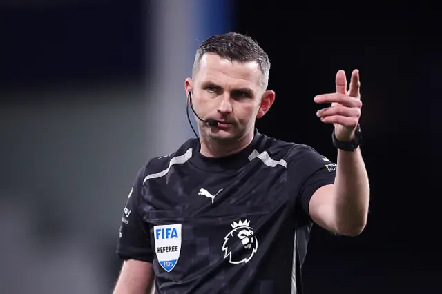 Referee Michael Oliver reacts