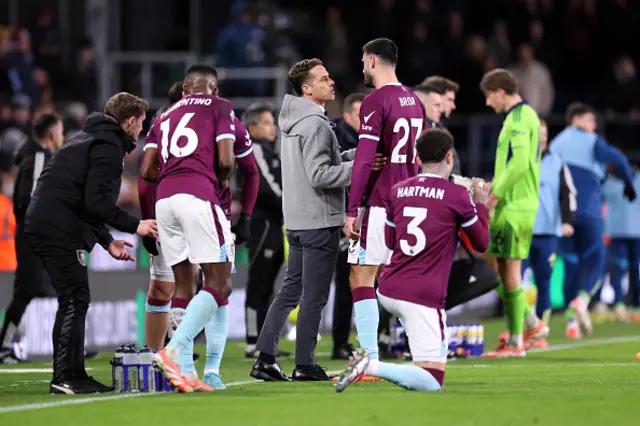 Scott Parker, Manager of Burnley, talks to Armando Broja