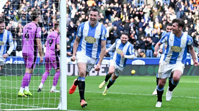 Murray Wallace celebrates the opening goal