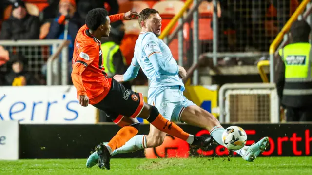 Amar Fatah has a shot for Dundee United against Motherwell