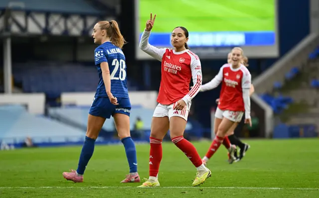 Olivia Smith of Arsenal celebrates scoring her team's third goal during the Barclays Women's Super League match between Everton and Arsenal at Goodison Park on December 13, 2025 in Liverpool, England.