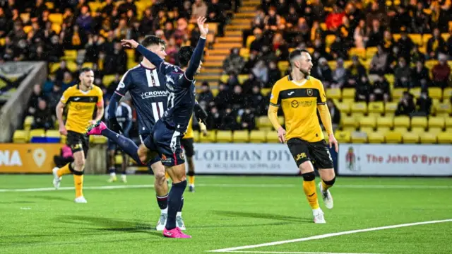 Yan Dhanda scores for Dundee against Livingston