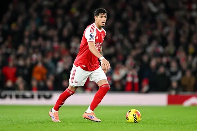 Piero Hincapie of Arsenal runs with the ball