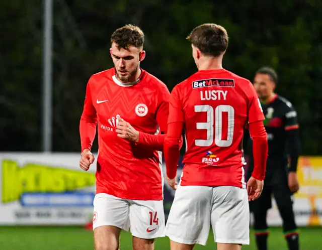Benji Magee of Larne opens the scoring during this Evening’s League fixture at Inver Park, Larne.