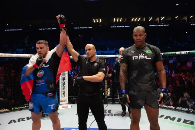 Vadim Nemkov has his hand raised