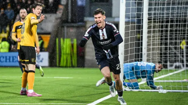 Cameron Congreve celebrates after scoring for Dundee against Livingston