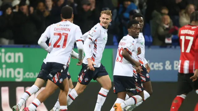 Sam Dalby celebrates for Bolton
