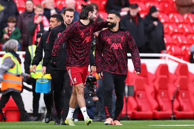 Mohamed Salah of Liverpool comes out for warm up with Dominik Szoboszlai