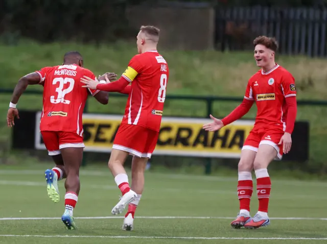Cliftonville celebrate Eric McWoods' goal