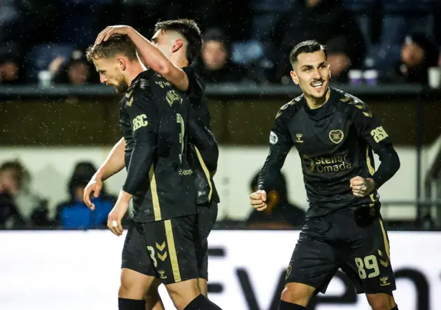 Lawrence Shankland congratulates Stephen Kingsley on his fantastic strike