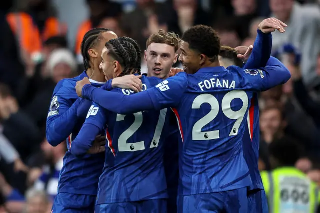 Cole Palmer of Chelsea scores a goal to make it 1-0 and celebrates with team-mates