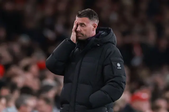 Rob Edwards looks dejected after Arsenal loss