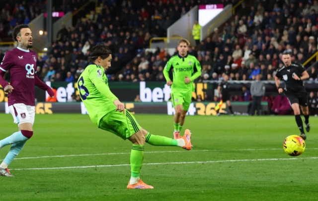 Fulham's Harry Wilson scores their third goal