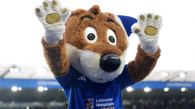 Leicester mascot waves
