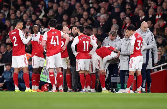 Mikel Arteta head coach of Arsenal speaks with his team