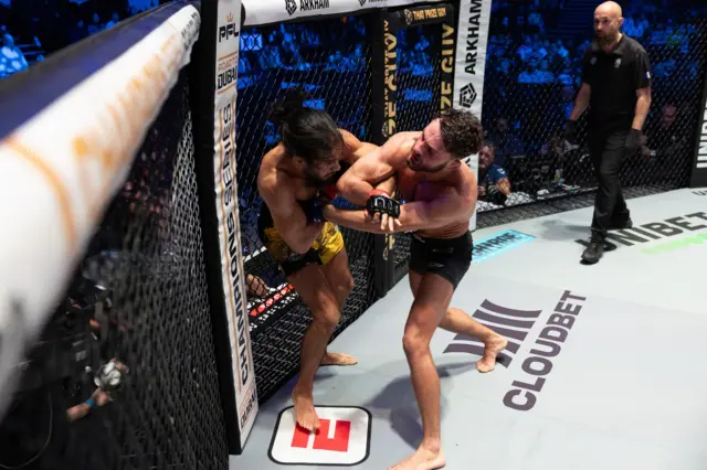 Levi Batchelor elbows Rayan Balbali