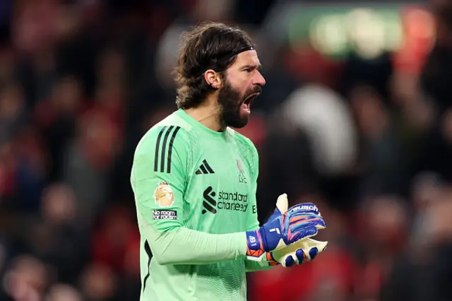Alisson Becker of Liverpool reacts