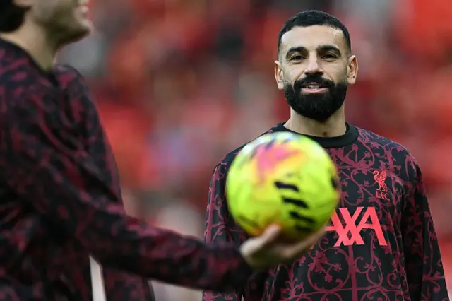 Mohamed Salah warms up