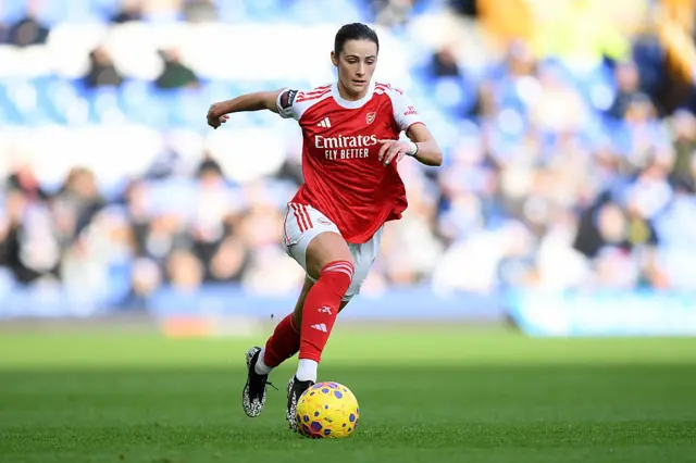 Emily Fox of Arsenal runs with the ball during the Barclays Women's Super League match between Everton and Arsenal at Goodison Park on December 13, 2025 in Liverpool, England.