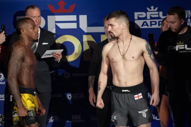 Taylor Lapilus stares at Liam Gittins at a weigh-in