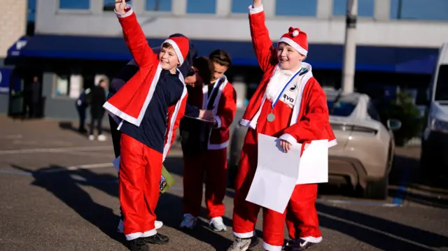Millwall fans dressed as Santa