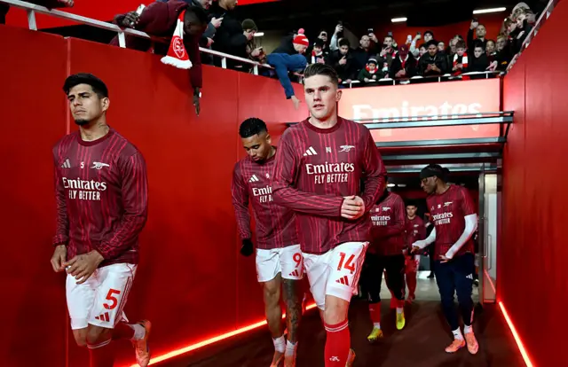 Arsenal players run out for warm up
