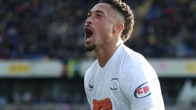 Daniel Jebison celebrates scoring