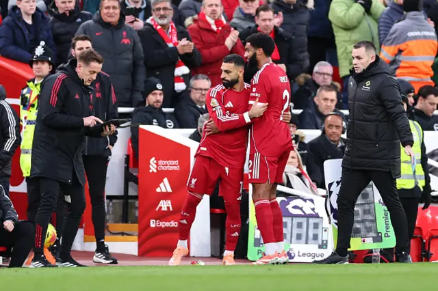 Mohamed Salah of Liverpool comes on