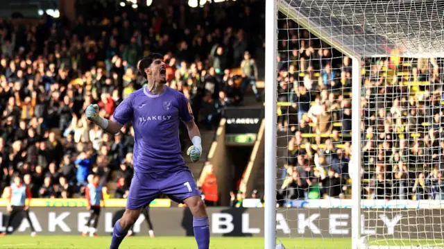 Norwich goalkeeper Vladan Kovacevic celebrating saving a penalty
