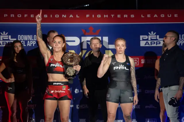 Cris Cyborg and Sara Collins standing side by side