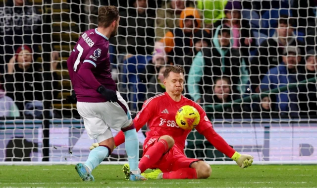Fulham's Bernd Leno saves from Burnley's Jacob Bruun Larsen