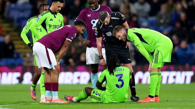 Bassey down injured
