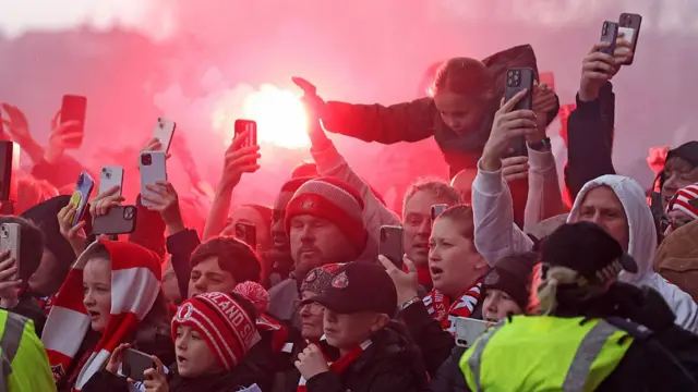 Sunderland fans wait to greet the team bus before the game against Newcastle United at the Stadium of Light on 14 December, 2025