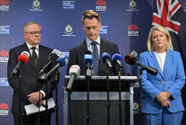 NSW Premier Chris Minns (C), Australian Prime Minister Anthony Albanese (L) and Counter-terrorism Yasmin Catley (R) at a press conference