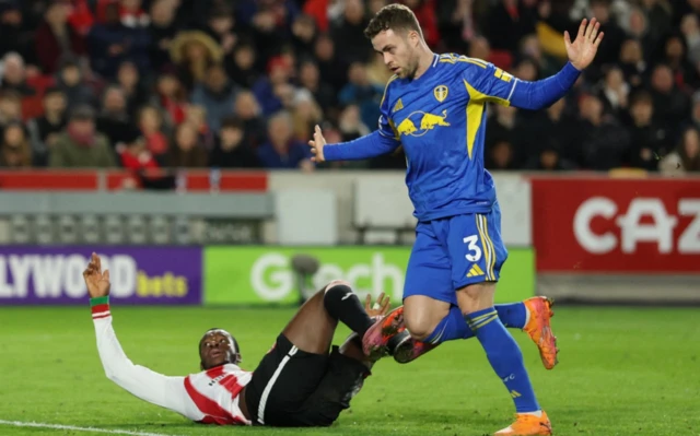 Leeds United's Gabriel Gudmundsson fouls Brentford's Dango Outtara to concede a penalty