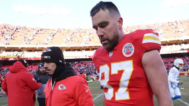 Travis Kelce leaves the field after the Kansas City Chiefs lose to the Los Angeles Chargers