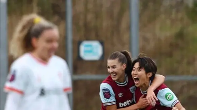 Ueki celebrates her goal