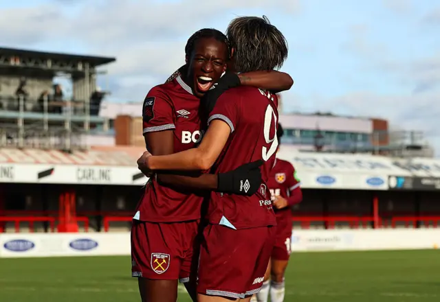 Riko Ueki of West Ham United celebrates scoring her team's first goal with teammate Viviane Asseyi