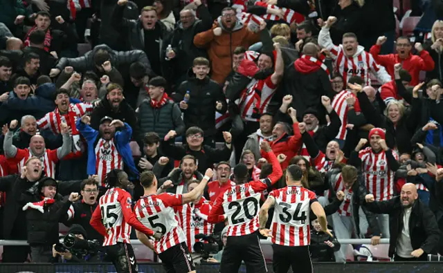 Sunderland players celebrate the opening goal
