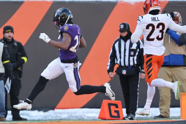 Rasheen Ali runs in a touchdown for the Baltimore Ravens against the Cincinnati Bengals