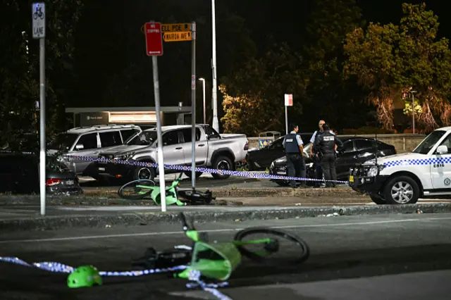 Police work at the scene after a shooting incident at Bondi Beach in Sydney on December