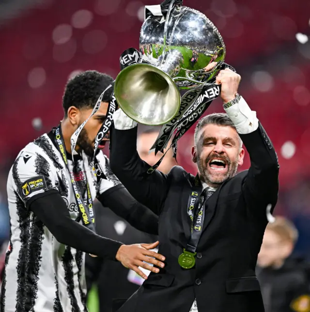 St Mirren manager Stephen Robinson with the trophy