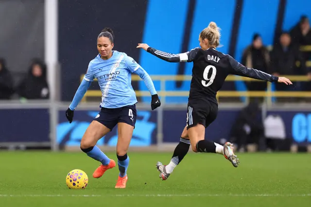 Jade Rose of Manchester City is put under pressure by Rachel Daly of Aston Villa