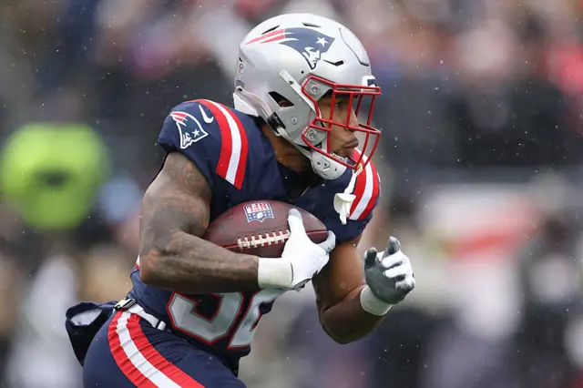 TreVeyon Henderson running with the ball