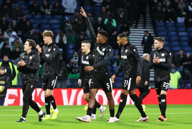 St Mirren players wave to their fans