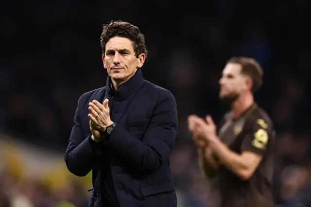 Keith Andrews looks on